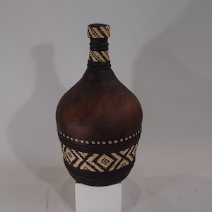 Old bottle / leather