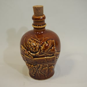 Earthenware bottle  / eau-de-vie / vintage