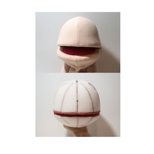 A hand puppet head made from foam ,made using digital download puppet pattern.