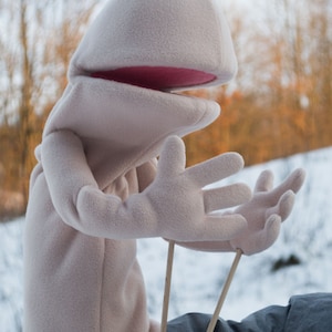 A practice hand puppet  made from foam and fleece ,made using digital download puppet pattern.