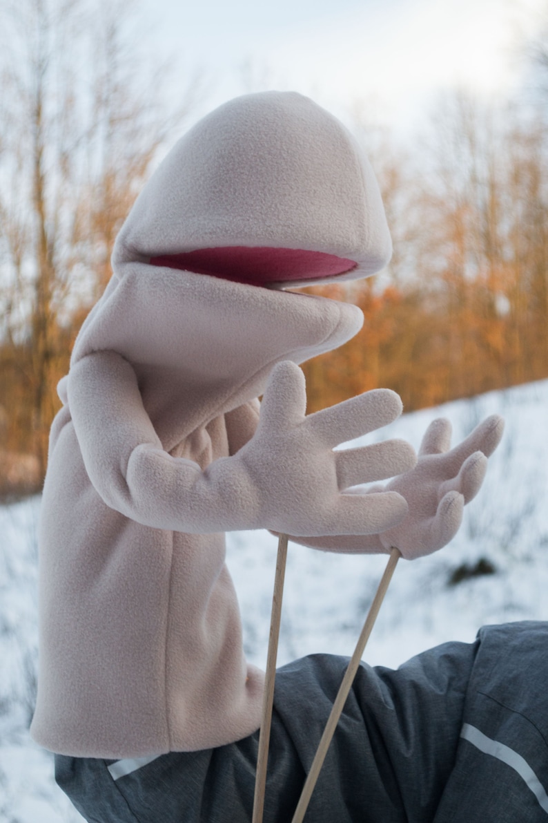 A practice hand puppet  made from foam and fleece ,made using digital download puppet pattern.