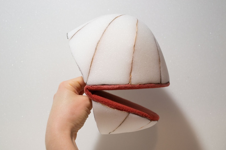 A hand puppet head made from foam ,made using digital download puppet pattern.