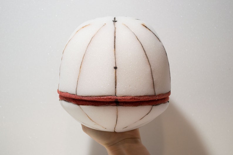 A hand puppet head made from foam ,made using digital download puppet pattern.