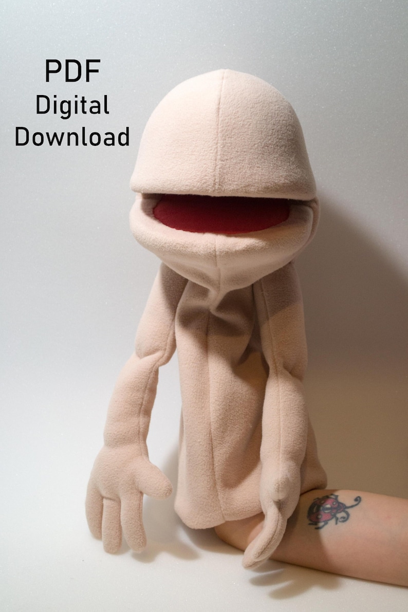 A hand puppet  made from foam and fleece ,made using a digital download puppet pattern.