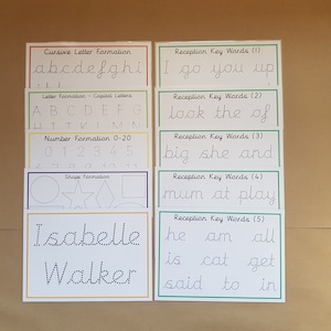 May include: Educational handwriting practice cards. The cards include cursive and capital letter formation, number formation, shape formation, and key words. White cards with colourful borders and black dotted lines for tracing.