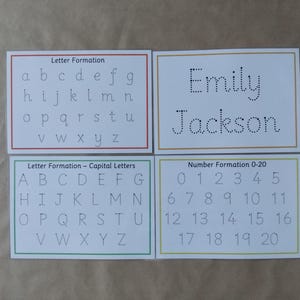May include: Four white cards with educational content. One card shows lowercase letters for letter formation. Another displays the name "Emily Jackson" in dotted lines. The other two cards show capital letters and numbers 0-20.