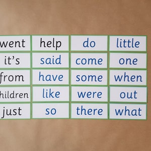 May include: A collection of flashcards with sight words, including "went," "help," "do," and "little." Each card has a white background with a green border and black or blue text. The cards are arranged in a grid.