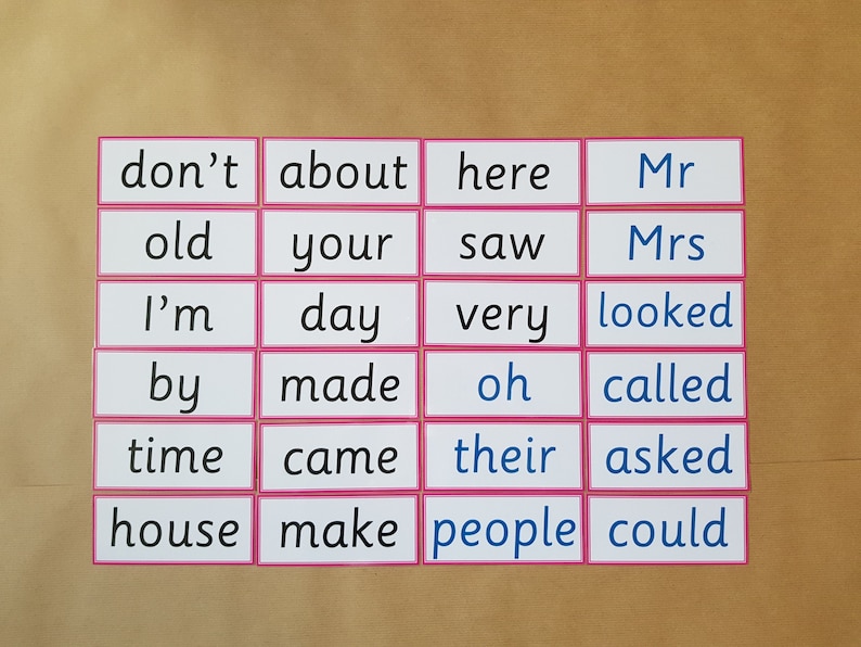 May include: A collection of flashcards with words in black and blue text, including "don't", "about", "here", "Mr", "old", "your", "saw", "Mrs", "I'm", "day", "very", "looked", "by", "made", "oh", "called", "time", "came", "their", "asked", "house", "make", "people", and "could".