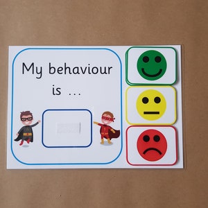May include: A behaviour chart with the text "My behaviour is ..." and superhero illustrations. It features a space for a visual marker and three emoji faces: happy, neutral, and sad. The chart is on a white background.