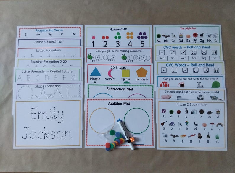 May include: Educational learning mats for children, featuring numbers, letters, shapes, and CVC words. Includes a whiteboard marker and colorful counters. The mats are designed for early childhood education.