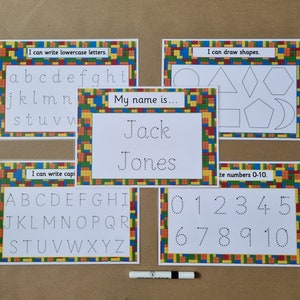 May include: Educational learning cards with colorful brick-style borders. Cards include tracing activities for lowercase and uppercase letters, shapes, and numbers 0-10. A card displays the name "Jack Jones". A dry-erase marker is included.