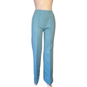 Vintage 1970s wide leg flare pants sky blue polyester stitched cuffs 1970s fashion 1970s womenswear stretch pants