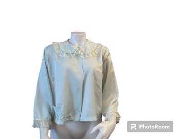 Vintage bed jacket 1950s light blue with lace trim and pocket snap front Stella Fagin silk blend 1950s lingerie