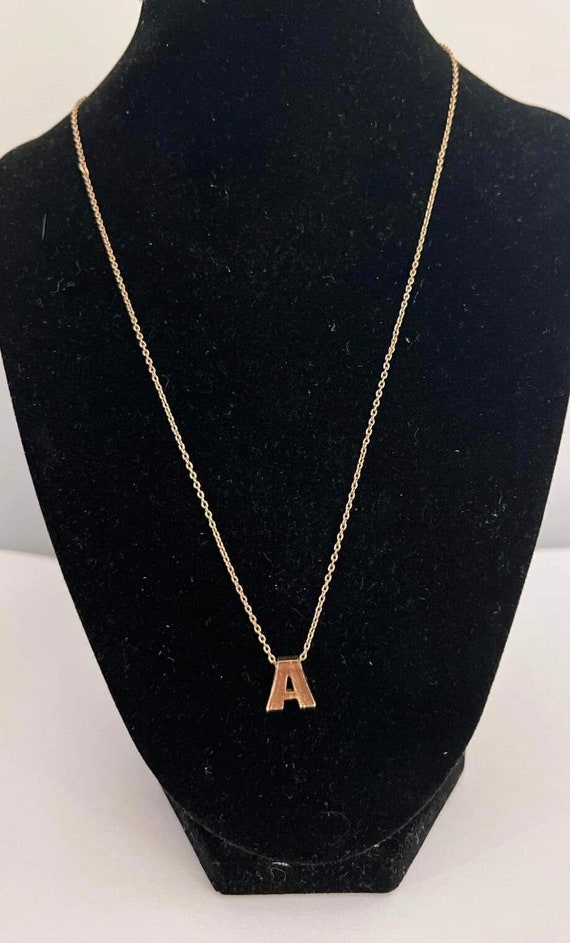 Vintage initial A pendant by AVON 1970s gold