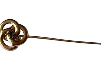 Antique stick pin triple knot gold with prong set stone love knot Gordian knot Victorian Edwardian jewelry