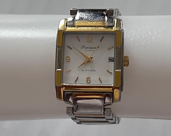 Vintage mens wrist watch Gruen Precision quartz stainless steel square face 2 tone gold and silver working condition with new battery