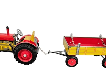 Vintage Schylling tractor and trailer wind up toy in original box