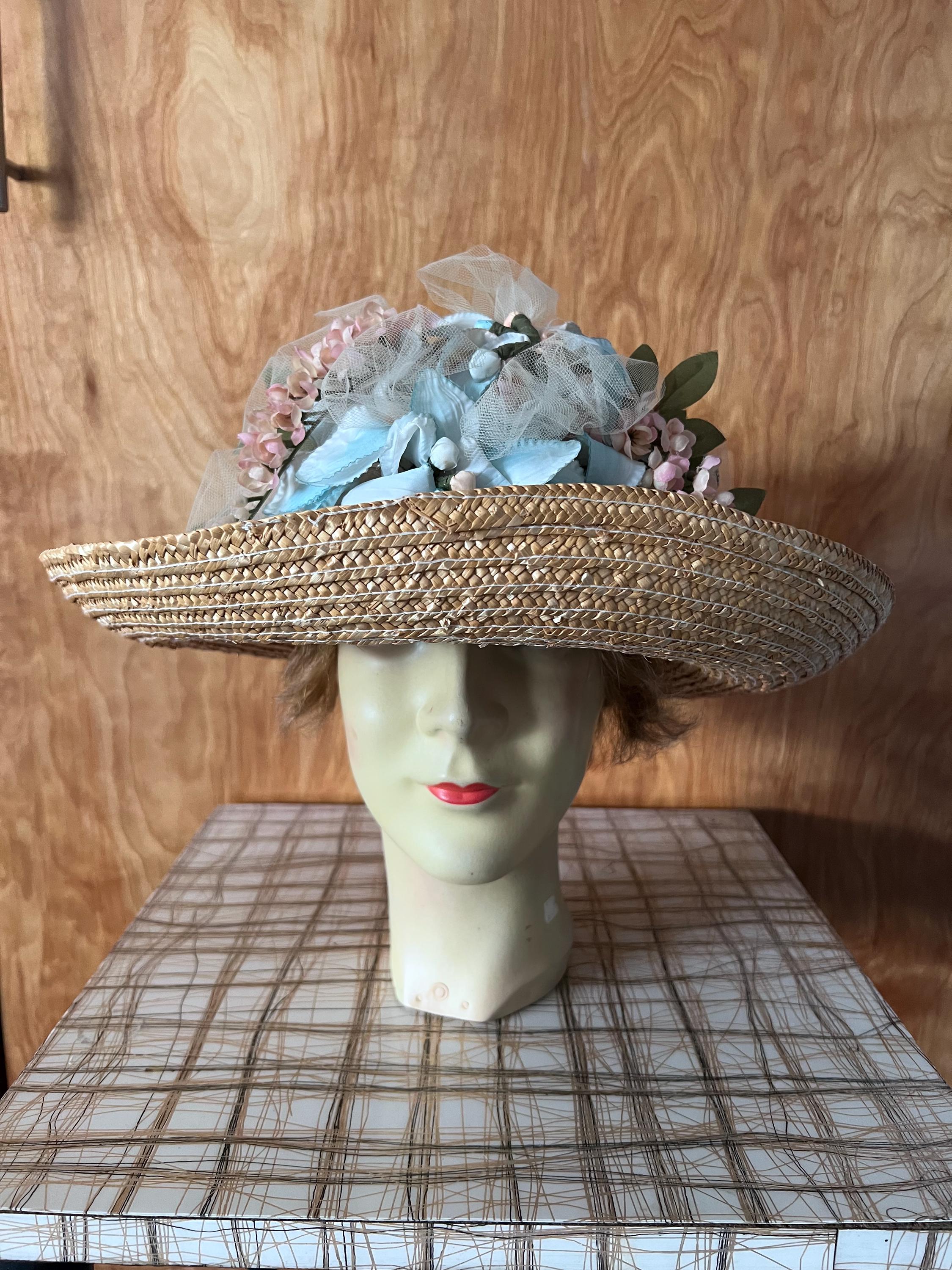 Vintage woven straw rattan hat with brim blue and pink flowers and ribbon People’s Republic of China beach garden party horse races