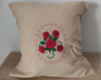 Cushion cover embroidered with a rose