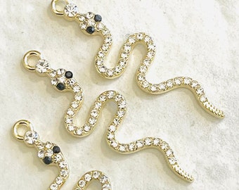 3 rhinestone and gold snake charms