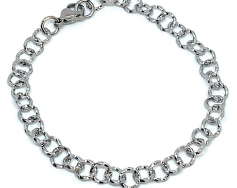 1 Textured link stainless steel bracelet w/lobster clasp - silver color