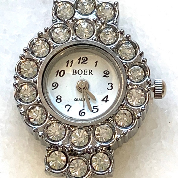 1 round rhinestones & silver tone quartz watch face