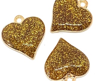 3 shiny golden color glitter heart charms - gold tone