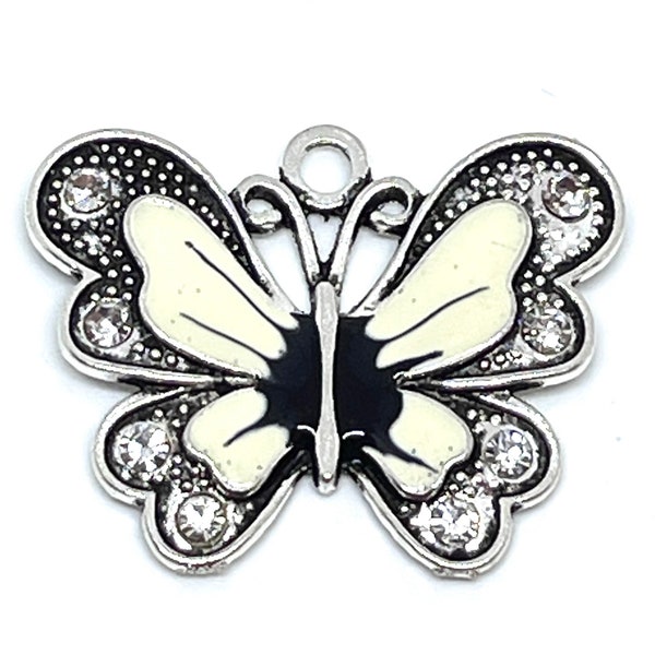 Pretty antique silver butterfly pendant - rhinestone accents - off white and blackish blue enamel