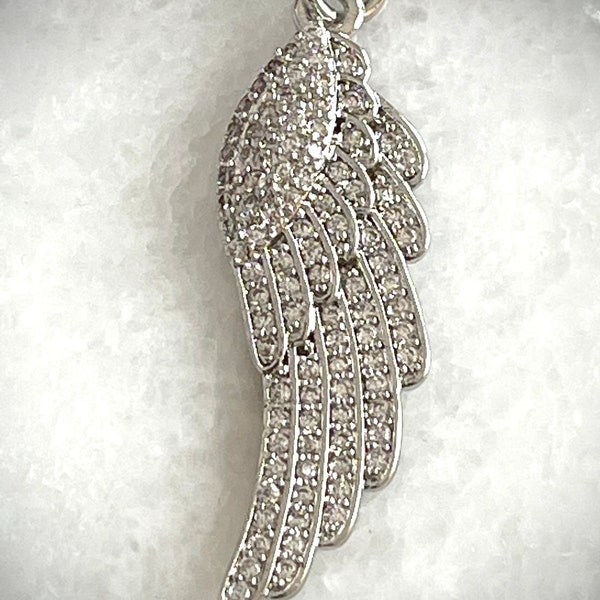 1 silver CZ rhinestone angel wing - religious - heaven