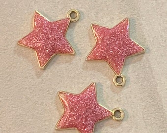 3 shiny pink glitter star charms  - gold tone