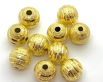 Set of 10 bright gold stardust textured round beads - 8mm