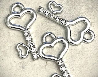 3 pretty silver plated and rhinestone heart shaped key charms