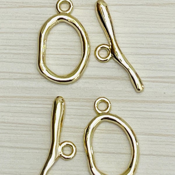 2 sets of oval shaped 16K gold plated toggle clasps