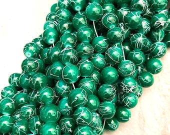 Drawbench baking painted 10mm dyed green glass beads - white swirl design