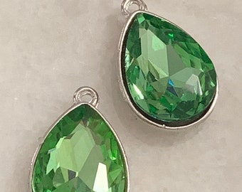 2 green peridot birthstone teardrop shaped silver tone charms - pendants
