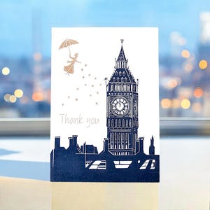 Mary Poppins-bedankkaart - blauw-witte klassieke scène van de Big Ben met gouden Mary Poppins die magische sterren verspreidt. Woorden: bedankt