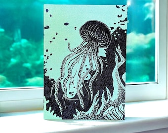 Jellyfish Linocut Card. Beautiful lino print image of a jellyfish swimming in the sea. For fans of nature and the ocean. Blank inside.
