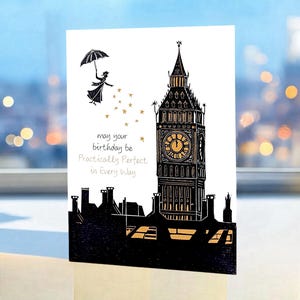 Tarjeta de cumpleaños de Mary Poppins: diseño en linograbado de Poppins volando sobre el Big Ben con las palabras: Que tu cumpleaños sea prácticamente perfecto en todos los sentidos
