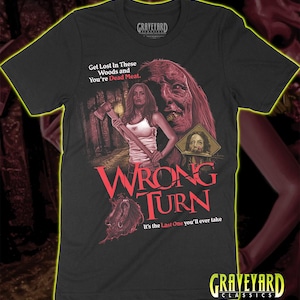May include: A black short-sleeve t-shirt featuring a graphic print from the movie Wrong Turn. The design includes a person holding an axe, a monstrous face, and the text: Get Lost In These Woods and You're Dead Meat. Wrong Turn. It's the Last One you'll ever take.