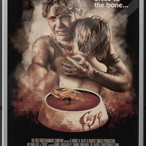 May include: A movie poster for the horror film "Cujo" featuring a woman and a child in a bloody bowl with a car submerged in the liquid. The poster has the text "Terror that bites to the bone..." and the title "Cujo".