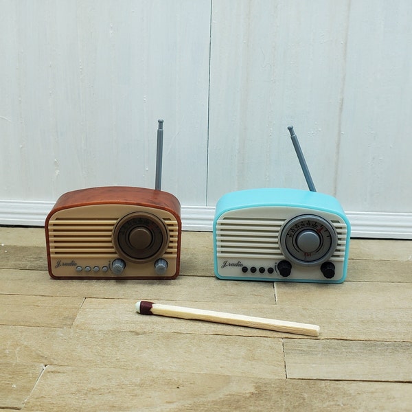 Dollhouse miniature radio accessory. Room box supply radio with antenna that can be raised. Retro-look miniature radio in sky blue or brown.