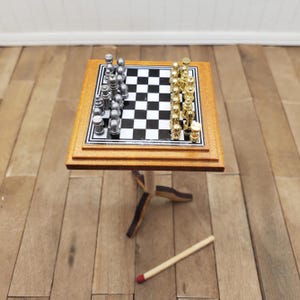 Dollhouse chess game. 1:12 scale oak chess board with loose metal playing pieces. Complete chess set for your dollhouse or miniature scene.