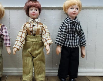 Miniature Boy Doll. 1:12 Scale Poseable Dollhouse Figure with porcelain features and fiber hair.