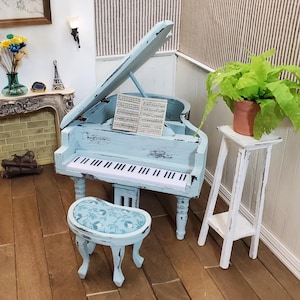 1:12 scale artisan crafted grand piano and stool. Miniature dollhouse piano chalk painted and distressed. Designer collectible heirloom.
