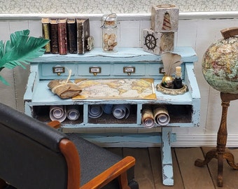 Dollhouse artisan made shabby chic nautical map desk with blotter and maps. Heirloom worthy 1:12 scale miniature desk with metal pulls.