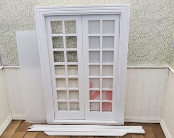 1:12 Dollhouse miniature double French doors painted white with interior trim pieces. DIY 7.5 x 5" doors ready to install or customize.