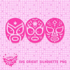 May include: Three pink luchador mask designs on a pink grid background. The masks have different decorative patterns and shapes. Text at the bottom reads "SVG CRICUT SILHOUETTE PNG" and "baby MORCEGO".