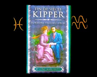 May include: A green and white box with the text "Fin de Siècle Kipper Fortune Telling Deck" and "By Ciro Marchetti". The box features an illustration of a couple sitting on a bench.
