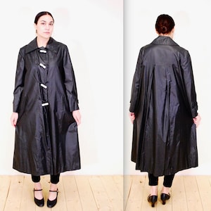 Black swing raincoat sales