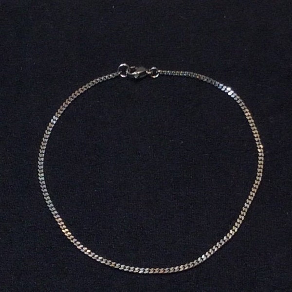 Stainless steel 5" to 10 1/2", tiny curb anklet or bracelet. Silver, gold, rainbow, black, & rose-gold. Non-tarnish. Waterproof.